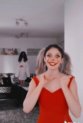 4. Sexy Norah Prigent Shows Cleavage in Red Dress