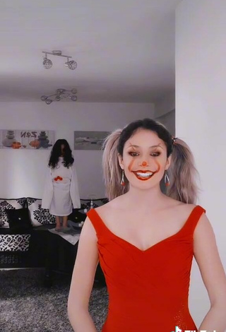 5. Sexy Norah Prigent Shows Cleavage in Red Dress