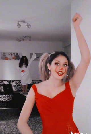 6. Sexy Norah Prigent Shows Cleavage in Red Dress