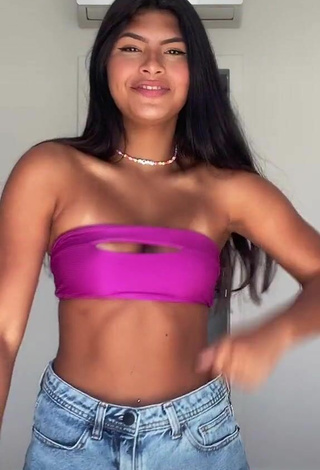 3. Hottest Thaina Amorim Shows Cleavage in Purple Bikini Top