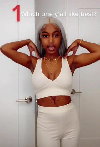 Amazing Tee Tee Shows Cleavage
