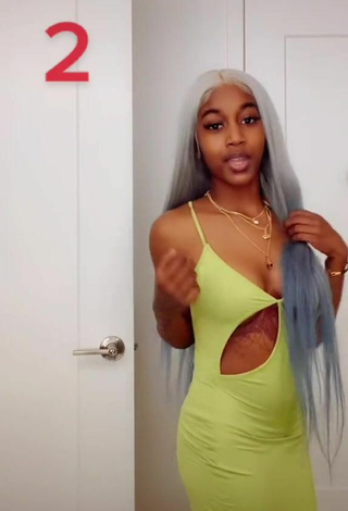 2. Amazing Tee Tee Shows Cleavage