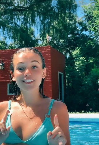 Beautiful Tizimentu Shows Cleavage in Sexy Blue Bikini Top at the Swimming Pool