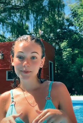 2. Beautiful Tizimentu Shows Cleavage in Sexy Blue Bikini Top at the Swimming Pool