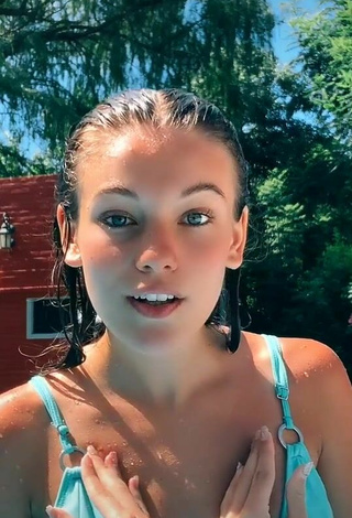 3. Beautiful Tizimentu Shows Cleavage in Sexy Blue Bikini Top at the Swimming Pool