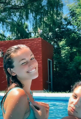 6. Beautiful Tizimentu Shows Cleavage in Sexy Blue Bikini Top at the Swimming Pool
