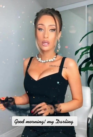 4. Amazing Valery Coxx Shows Cleavage in Hot Black Tank Top