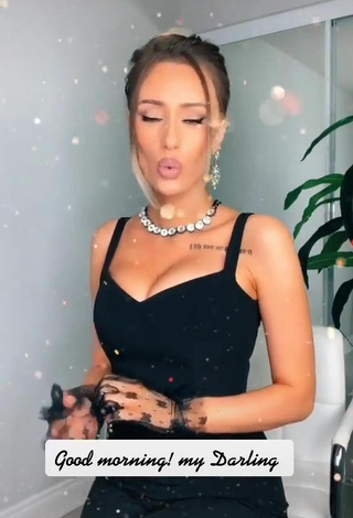 6. Amazing Valery Coxx Shows Cleavage in Hot Black Tank Top