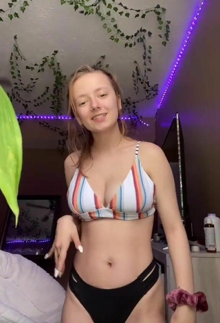 Hot Cammy Shows Cleavage in Striped Bikini Top