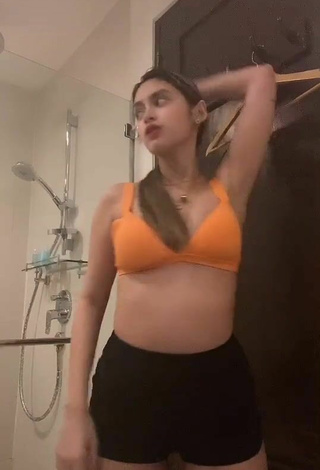 6. Sexy Yvonne Aresu in Orange Bikini Top