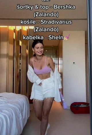 6. Sexy Anna Šulcová Shows Cleavage in Purple Bikini Top