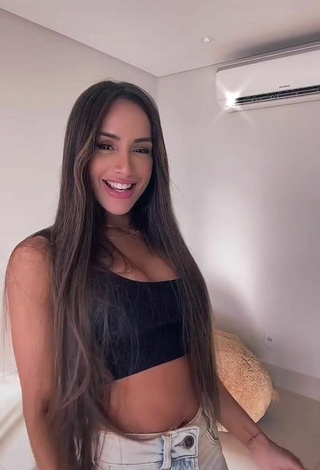 Sweet Késia Muniz de Oliveira Shows Cleavage in Cute Black Crop Top