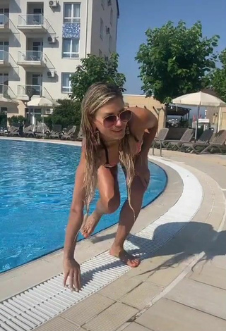 2. Cute Bella Potemkina in Bikini at the Swimming Pool