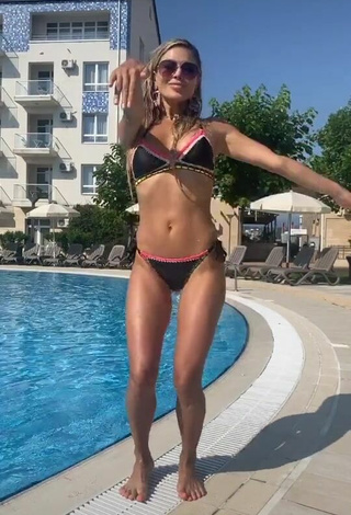 5. Cute Bella Potemkina in Bikini at the Swimming Pool