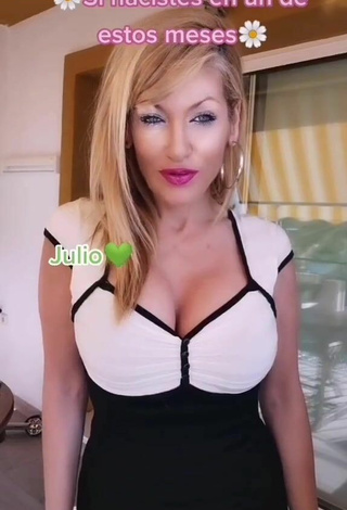 Alluring Lidia Shows Cleavage in Erotic Dress