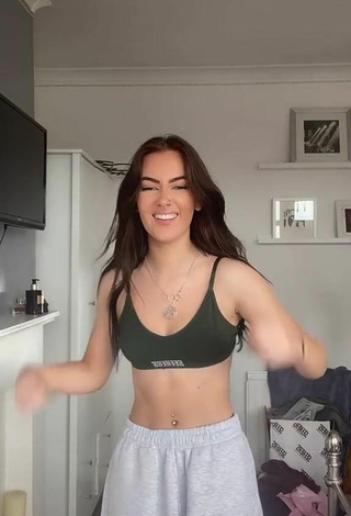 2. Beautiful Emily Steers in Sexy Olive Crop Top