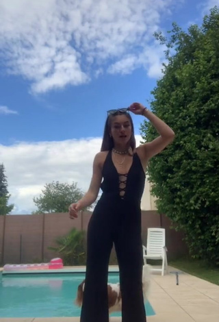 1. Sexy EstelleTvo Shows Cleavage in Black Overall at the Swimming Pool