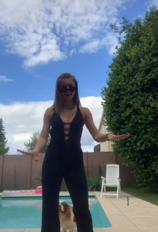2. Sexy EstelleTvo Shows Cleavage in Black Overall at the Swimming Pool