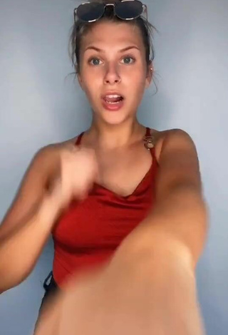 2. Sexy Hannah Simpson in Red Top Braless