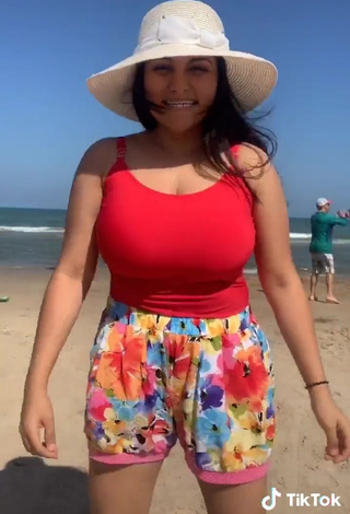 3. Sexy Heer Naik in Red Swimsuit at the Beach