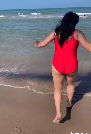 4. Sexy Heer Naik in Red Swimsuit at the Beach