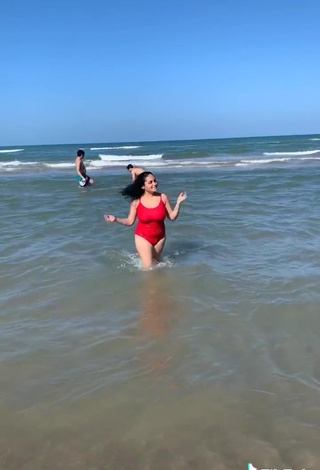 7. Sexy Heer Naik in Red Swimsuit at the Beach