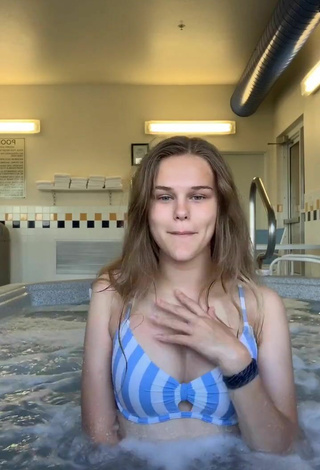 2. Sexy Dakota Young in Striped Bikini Top in the Pool
