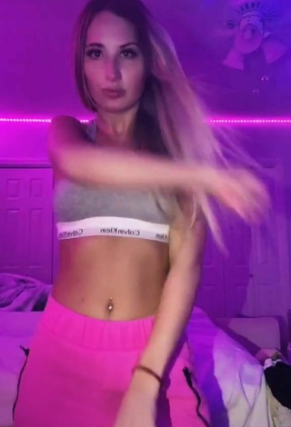 3. Sexy Ali Marie Shows Cleavage in Grey Sport Bra