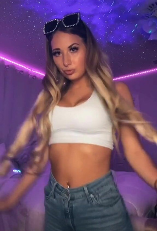 Seductive Ali Marie Shows Cleavage in White Crop Top