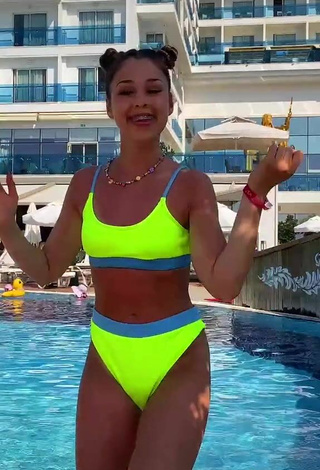 5. Sexy Maria Jeleniewska in Lime Green Bikini at the Swimming Pool