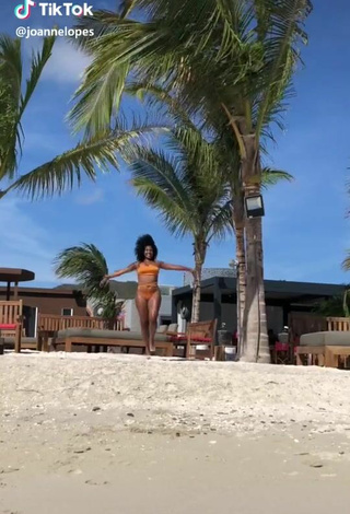 Sexy Joanne Lopes in Orange Bikini at the Beach
