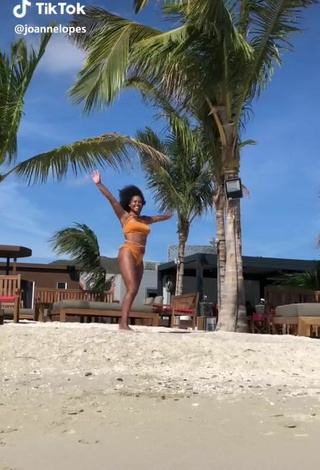 2. Sexy Joanne Lopes in Orange Bikini at the Beach