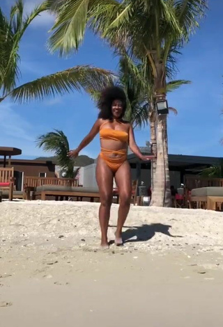 3. Sexy Joanne Lopes in Orange Bikini at the Beach