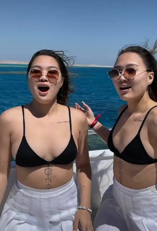 4. Sweetie Tomiris & Nargiz Kanatova in Black Bikini Top on a Boat