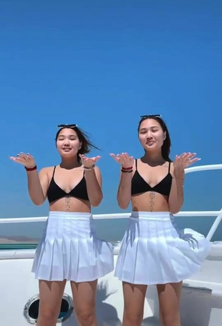 Cute Tomiris & Nargiz Kanatova in Black Bikini Top on a Boat