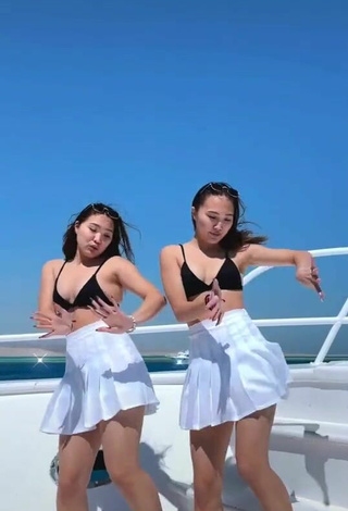 4. Cute Tomiris & Nargiz Kanatova in Black Bikini Top on a Boat
