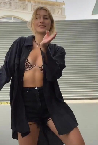 5. Sexy Katerina Saranti in Leopard Bikini Top