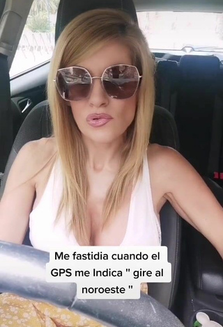 4. Lidia Demonstrates Alluring Cleavage in a Car