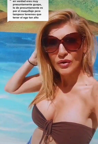 3. Sexy Lidia Shows Cleavage in Brown Bikini Top at the Pool