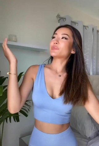 3. Sexy Cina Shows Cleavage in Blue Crop Top