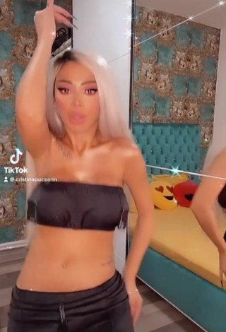 2. Hot Cristina Pucean in Black Tube Top while doing Belly Dance