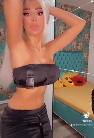 3. Hot Cristina Pucean in Black Tube Top while doing Belly Dance