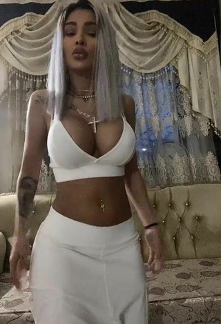 2. Beautiful Cristina Pucean Shows Cleavage in Sexy White Crop Top