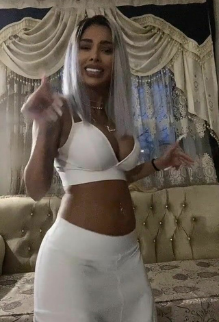 3. Beautiful Cristina Pucean Shows Cleavage in Sexy White Crop Top