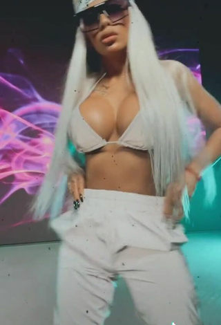 4. Hot Cristina Pucean Shows Cleavage in White Bikini Top