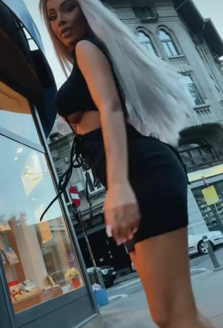 2. Hottie Cristina Pucean in Black Dress in a Street