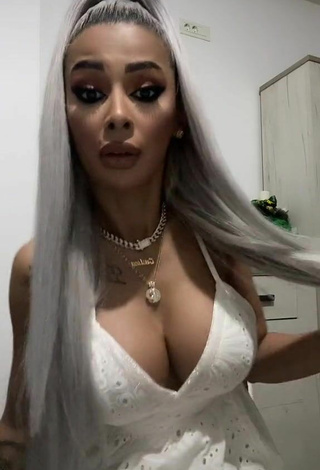 Beautiful Cristina Pucean Shows Cleavage in Sexy White Dress