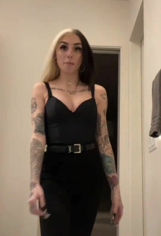 Beautiful Cruella Morgan Shows Cleavage in Sexy Black Top