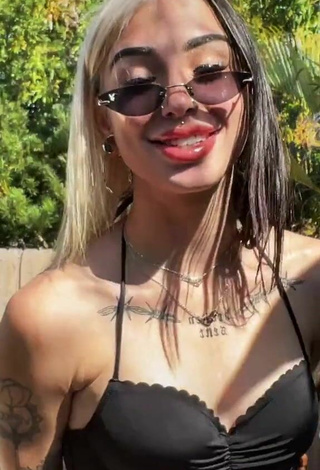 6. Sweetie Cruella Morgan in Black Bikini Top