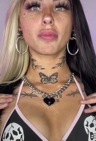 6. Sexy Cruella Morgan Shows Cleavage in Bikini Top